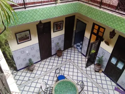 an overhead view of a house with a table and chairs at HOTEL EL AMAL in Marrakech