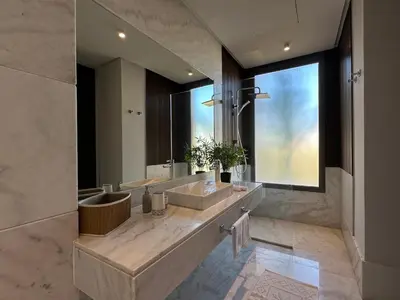 a bathroom with two sinks and a large mirror at Luxury living/Terrace/Pool in Marrakech