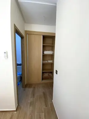 an empty room with a closet in a room at App centre-ville in Marrakech