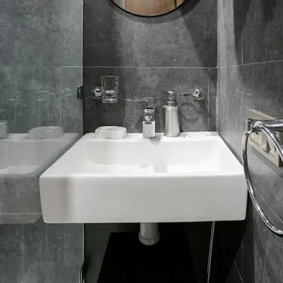 a bathroom with a white sink and a mirror at African Dream - Marrakech Centre in Marrakech