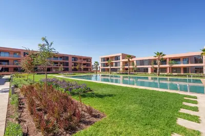 an image of a swimming pool at a apartment complex at Belle vue, noria golf in Marrakech