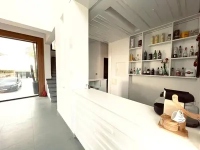 a kitchen with a white counter and shelves at Villa Dar El Hna in Marrakech