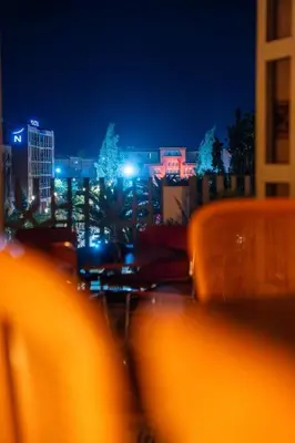 a view of a city at night with at LUXURY apartment in Marrakech