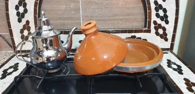 a tea kettle sitting on top of a kitchen sink at Mabrouka in Marrakech