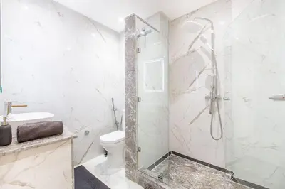 a bathroom with a shower and a toilet and a sink at New! Guéliz , Modern , Terrasse in Marrakech
