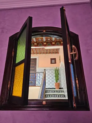 a picture of a room through a window at Riad yazuinaa in Marrakech