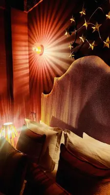 a bedroom with a bed with a starry ceiling at Riad & Spa Stella Cadente Marrakech in Marrakech