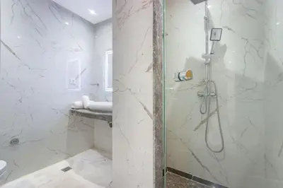 a bathroom with a shower and a toilet at NEW! Plein Gueliz, wifi, terrasse in Marrakech