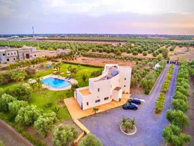 an aerial view of a house with a swimming pool at Séjour idéal a Marrakech - Villa spacieuse tout confort in Marrakech