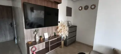 a living room with a flat screen tv on a wall at Appartement spacieux & lumineux à Gueliz in Marrakech