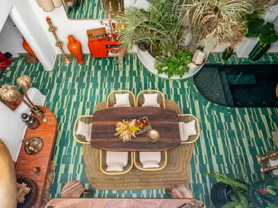 an overhead view of a table and chairs in a room at Riad Nesayam - Riad Privatisé - 3 Suites - Piscine Chauffée in Marrakech