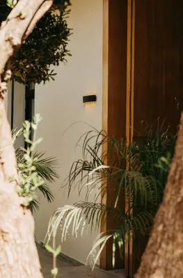 a room with some plants next to a door at Villa Ayani in Marrakech