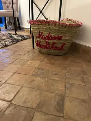 a basket sitting on top of a tile floor at Loft Gueliz in Marrakech