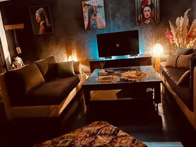 a living room with a couch and a coffee table at Loft Gueliz in Marrakech