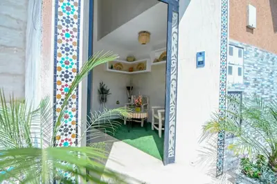 a view of a dining room with a table in a building at The Skyline Stay in Marrakech