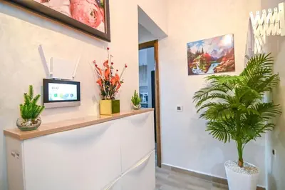 a living room with a counter and a plant at The Skyline Stay in Marrakech