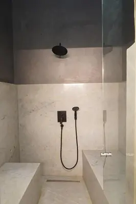 a bathroom with a shower with a showerigunigunigun at Riyad Lion Rouge in Marrakech