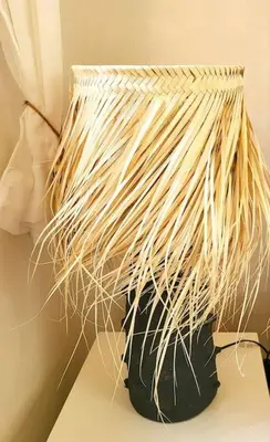 a vase filled with spaghetti on top of a table at Riad traditionnel de charme 3 chambres in Marrakech
