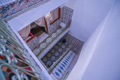 an overhead view of a staircase in a house at Oasis Medina Hostel in Marrakech