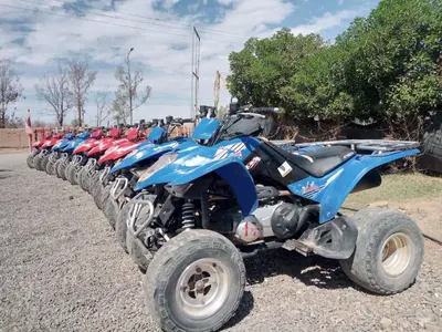 a row of atvs parked in a row at Quad Marrakech in Marrakech