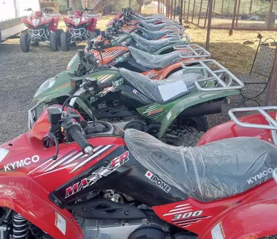 a row of motorcycles parked next to each other at Quad Marrakech in Marrakech