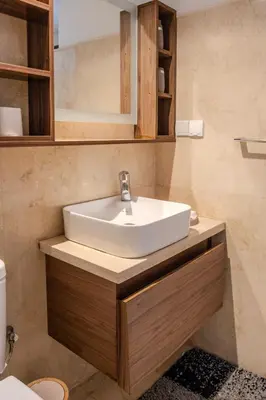 a bathroom with a sink and a toilet at Oasis urbaine - Pearl Garden luxe et confort in Marrakech