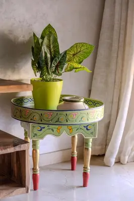 a potted plant on a table in a room at Oasis urbaine - Pearl Garden luxe et confort in Marrakech