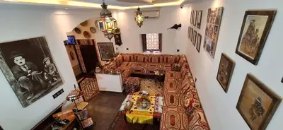 an overhead view of a living room with a couch at Hostel Dar Ben Youssef in Marrakech