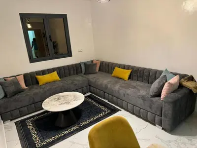 a living room with a couch and a table at Marrakech top 1 in Marrakech