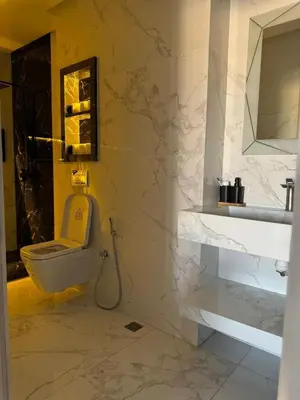 a bathroom with a toilet and a sink at Marrakech top 1 in Marrakech