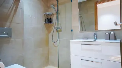 a bathroom with a shower and a sink at Havre de Paix à Noria Golf Marrakech in Marrakech