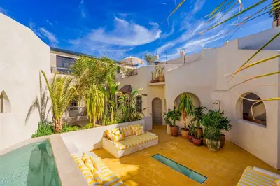 an image of a house with a swimming pool at Suites & Spa - Riad XO in Marrakech