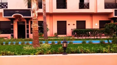 a parking meter in front of a building at M32 Cosy Loft in Marrakech
