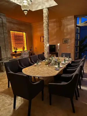 a large dining room with a table and chairs at Villa Shambhala in Marrakech