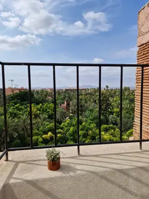 a view of the city from a balcony at Luxueux Duplex rooftop en plein cœur de Majorelle in Marrakech