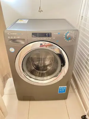 a washing machine is sitting in a room at Les Douces Nuits De Marrakech in Marrakech