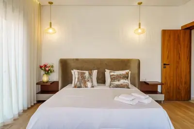 a bedroom with a large bed with two towels on it at Sublime Villa A in Marrakech
