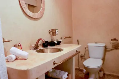 a bathroom with a sink and a toilet at Riad CHEZ MOI in Marrakech
