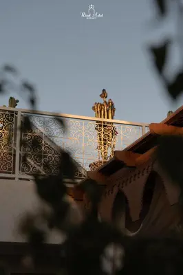 a view of a building with a railing and aitureshiba at Riad Aslal in Marrakech