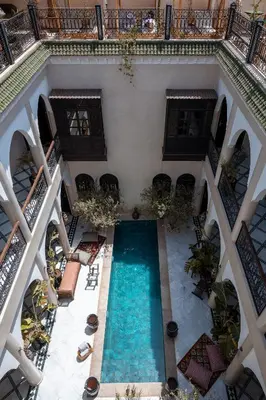 an overhead view of a swimming pool in a building at Alrashid Marrakech Boutique Hotel & SPA in Marrakech