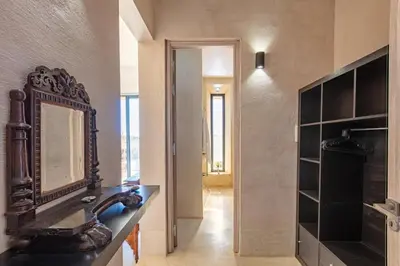 a bathroom with a sink and a mirror on the wall at Villa Kela Serene in Marrakech