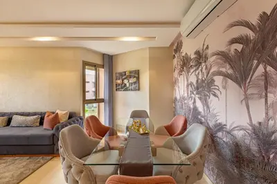 a living room with a couch and chairs at New! Résidence de Luxe avec Piscine & parking in Marrakech