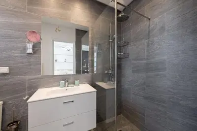 a bathroom with a sink and a mirror at appartement hyper centre in Marrakech