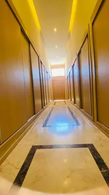 a hallway with a swimming pool in a building at Résidence nour 5 in Marrakech