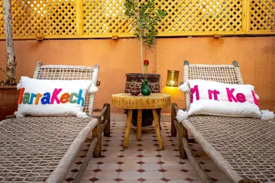 two chairs with pillows with the words mr and mrs on them at Riad Brothers in Marrakech