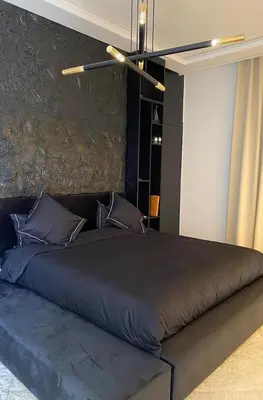 a bedroom with a large bed in a room at Palmeria luxery in Marrakech