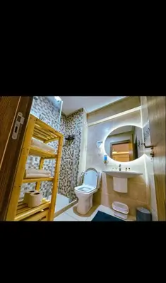 a bathroom with a toilet and a sink at Stylish Appartement in Marrakech in Marrakech