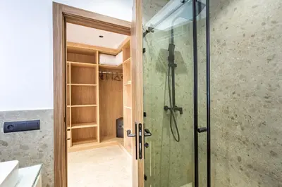 a shower with a glass door in a bathroom at Villa Gina, chic et Moderne avec piscine&terrasse in Marrakech