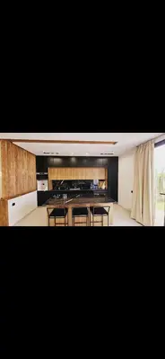 a large kitchen with a island in a room at Luxe villa in marrakech in El Makina