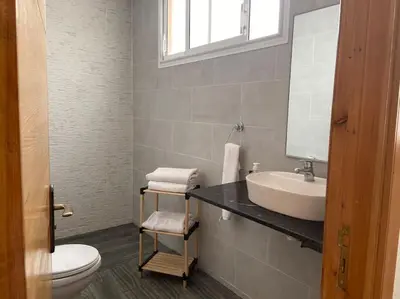 a bathroom with a sink and a toilet at Marrakech Dar El Hijazi 2 in Marrakech